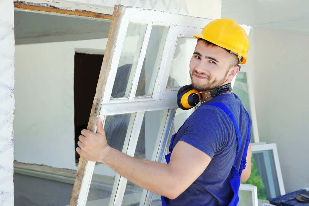 person in the process of window replacement